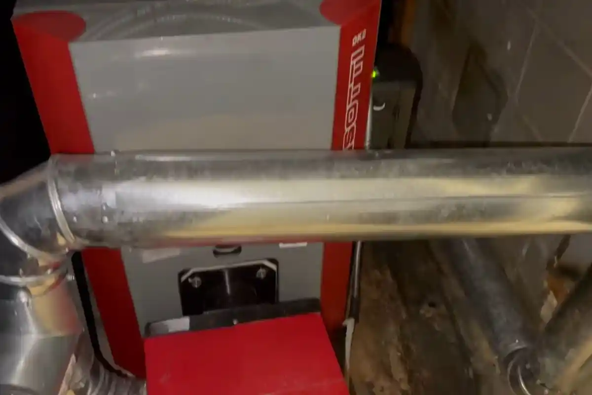 Oil furnace and ductwork connection, a common source of puffback soot residue